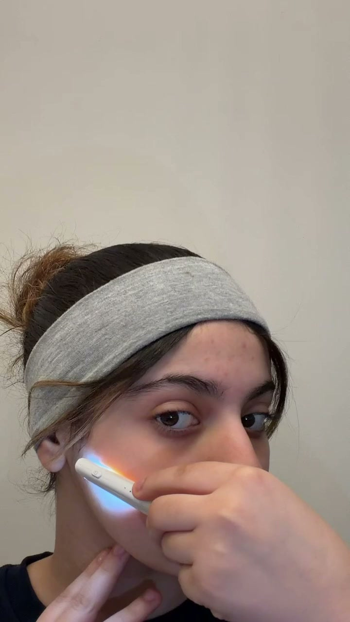 The device gliding along the jawline