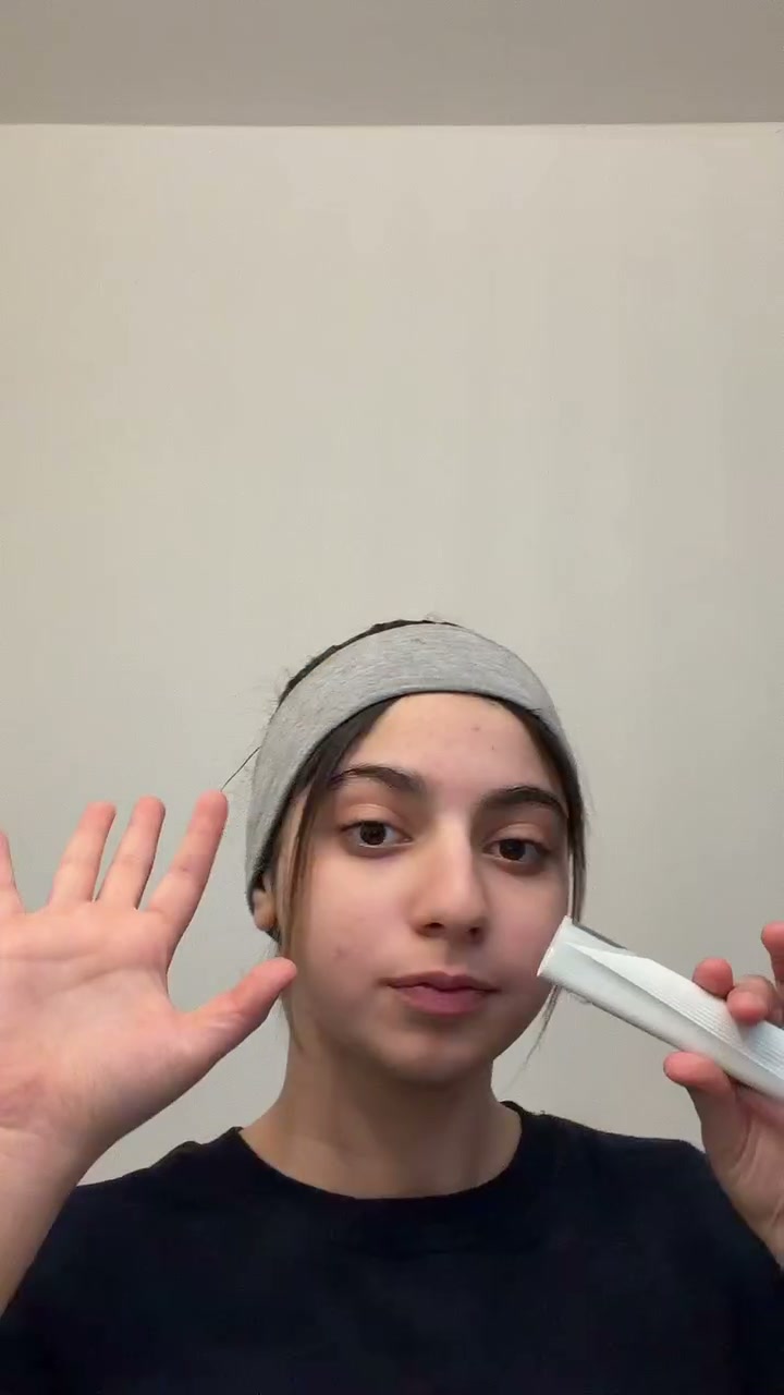 Reveaskin's first tester holding the Sonic Dermaplaner Pro
